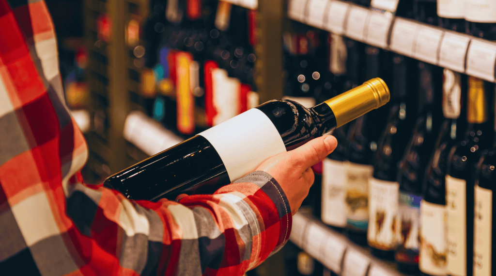Le choix d'une bouteille de vin rouge chez ETS Pinque